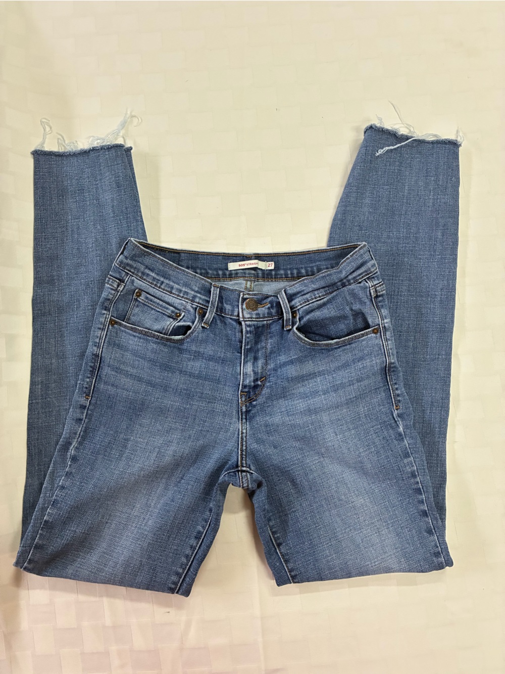 Levi's Light Blue Cropped Jeans with Frayed Ankles